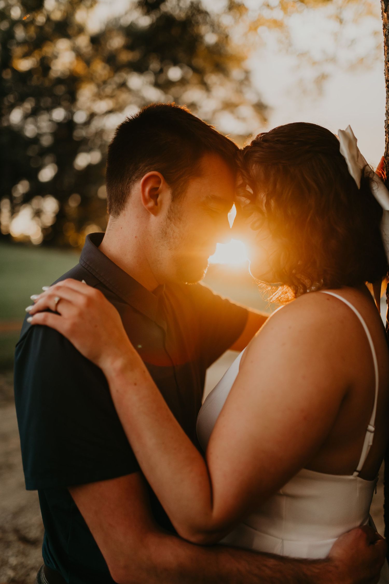 Romantic couple in warm sunset lighting sharing intimate embraces in a series of connected artistic shots.