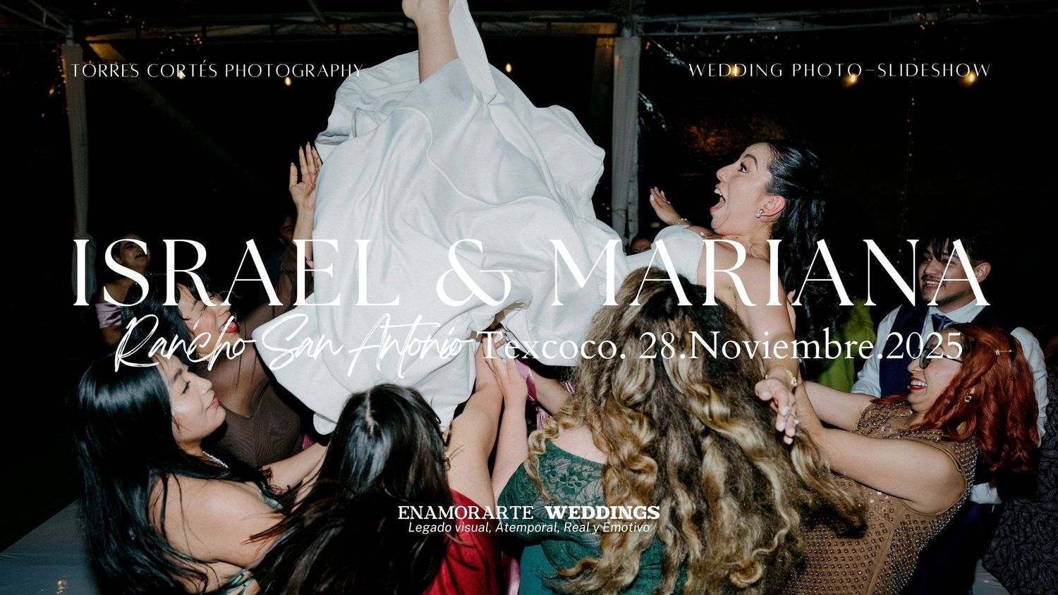 Wedding guests dancing and celebrating at a reception with dim lighting and festive atmosphere.