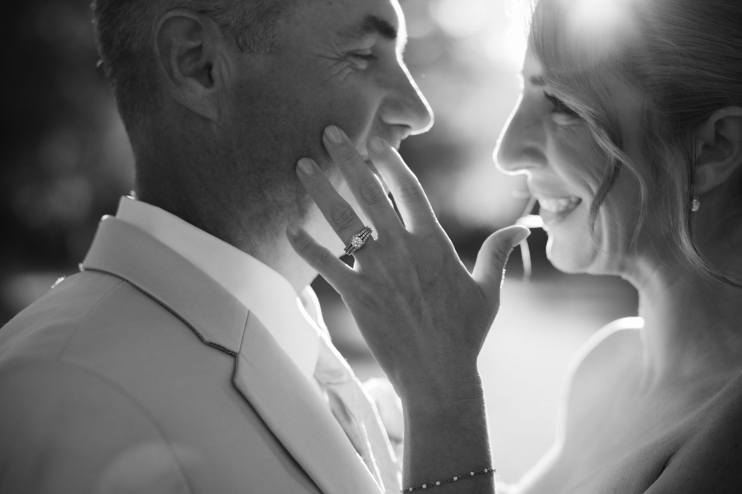 Intimate black and white portrait series capturing romantic wedding moments.