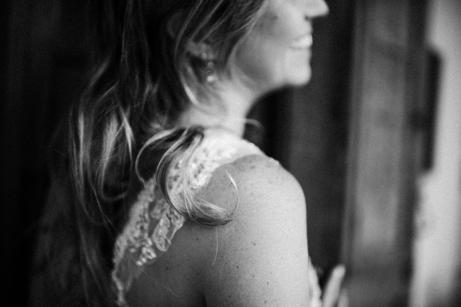 Close-up portrait showing delicate lace details and soft natural lighting.