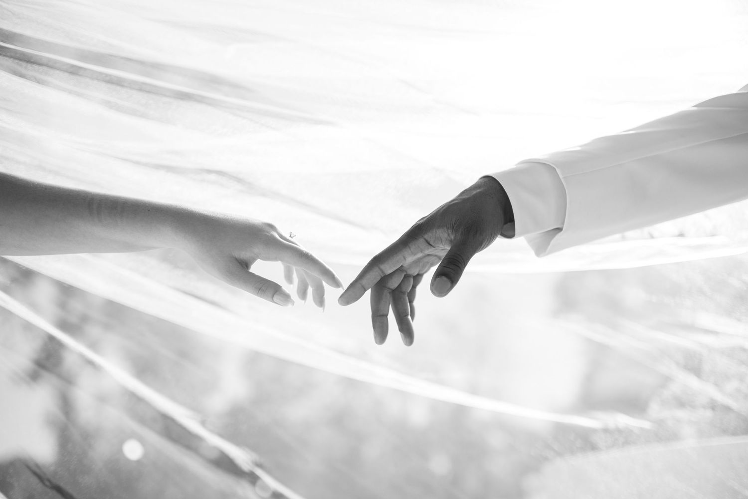 Abstract black and white architectural photograph with dramatic lighting.