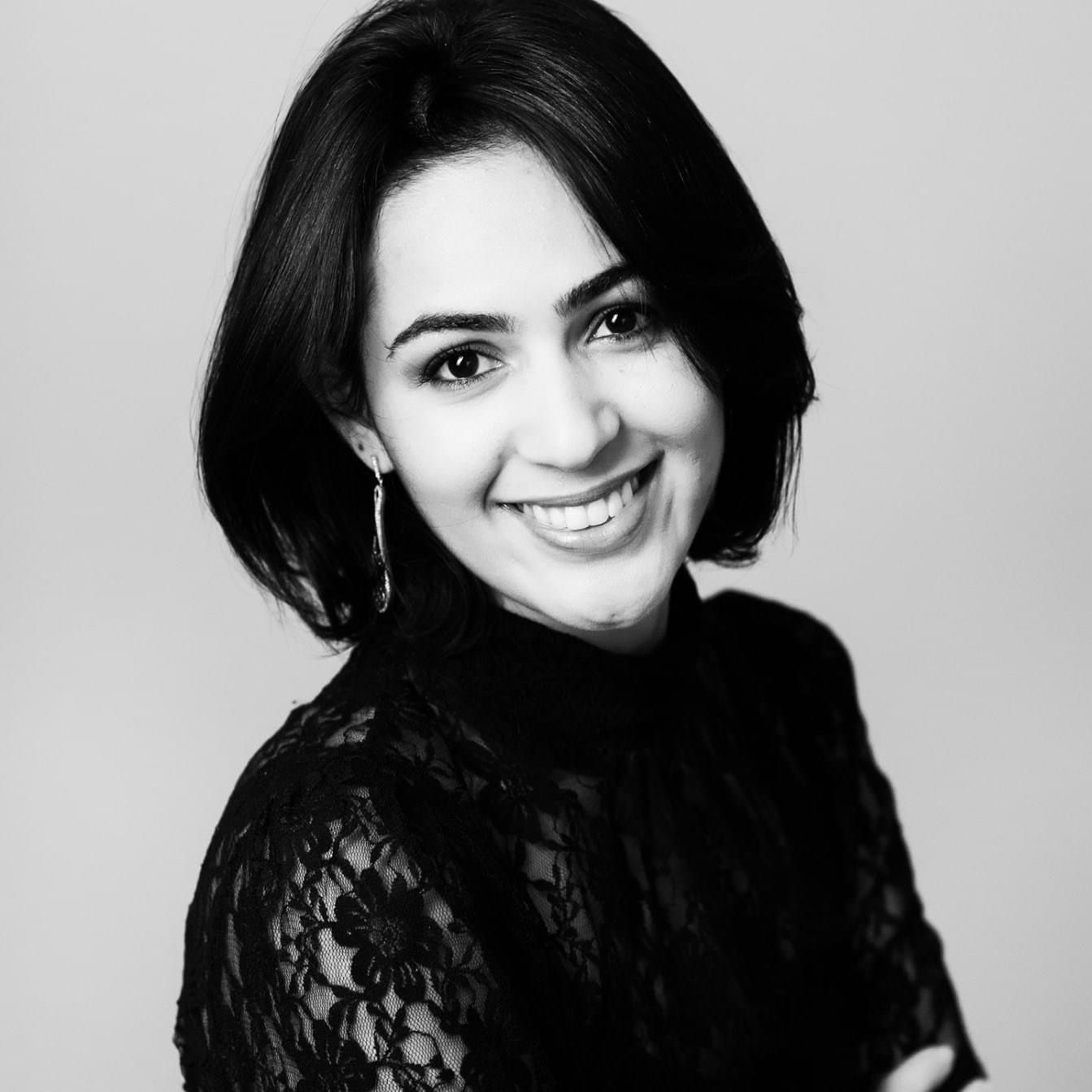 Black and white portrait series showing different poses and expressions.