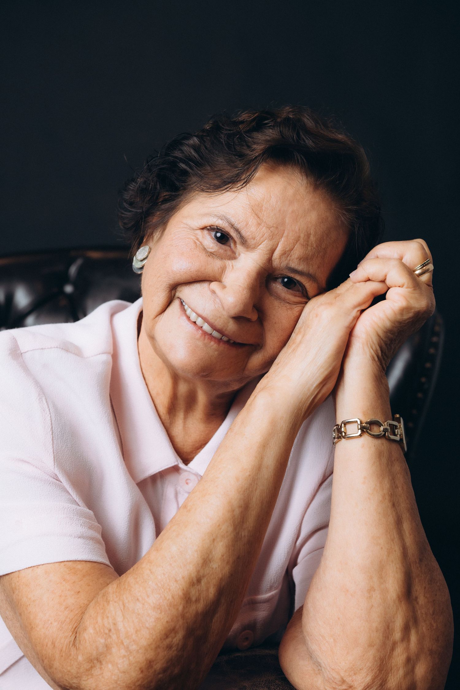 Intimate portrait series showing relaxed poses in soft lighting.
