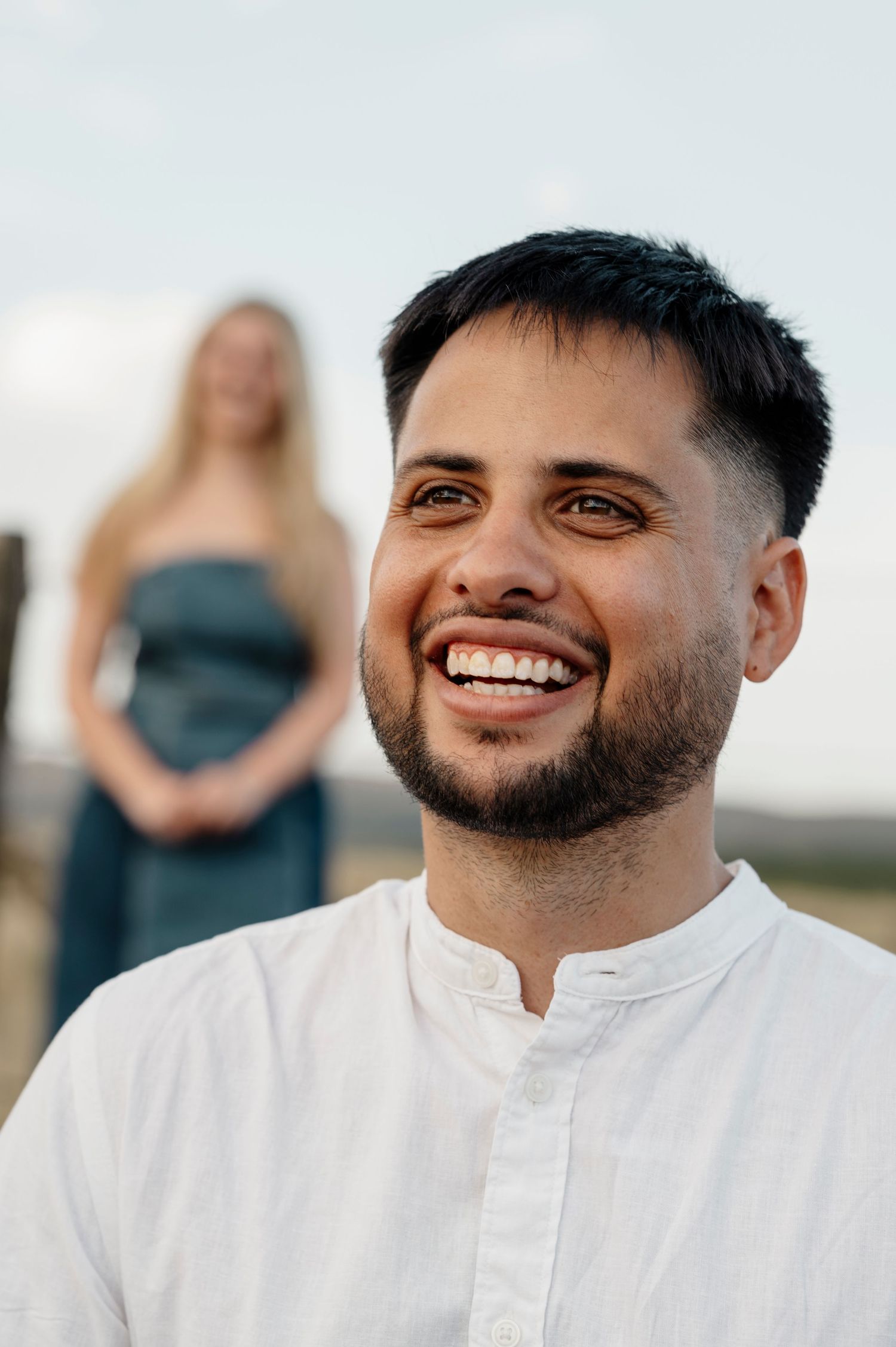 A series of candid emotional expressions captured during what appears to be a special outdoor moment.