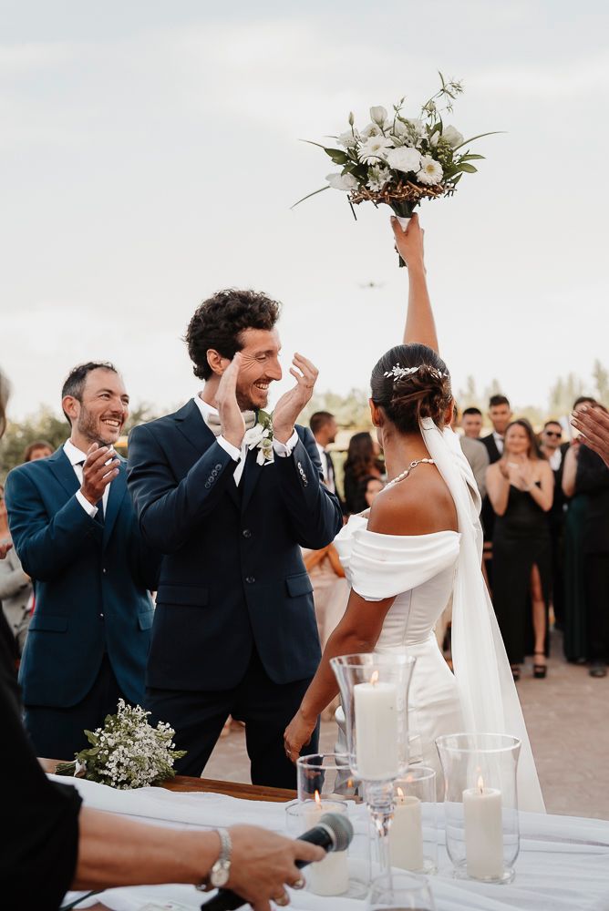 A series of four wedding celebration photos showing joyful moments during a reception outdoors. wedding in mendoza
