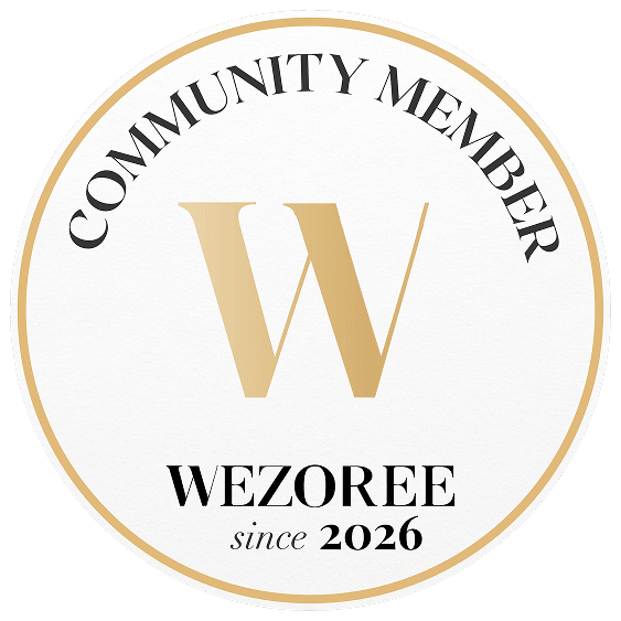 Wezoree Community Member badge, a circular gold-bordered seal with a large W emblem, established since 2026.