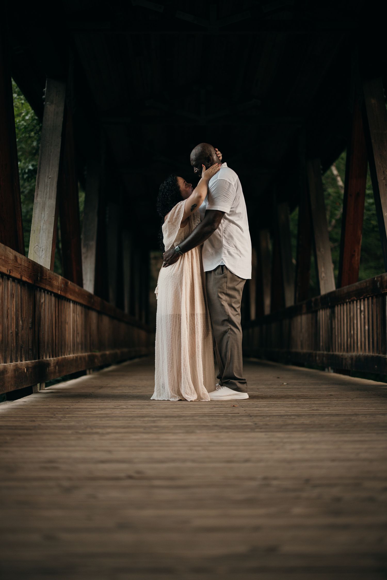 Romantic portraits on the Roswell Mills covered bridge.