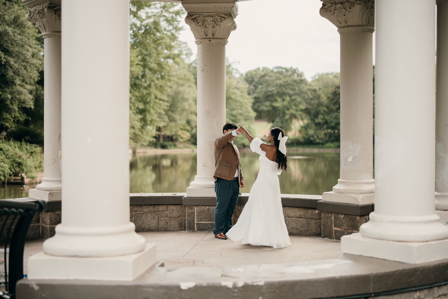 Atlanta wedding photographer capturing a couple at the Piedmont Park Active Oval at sunset.