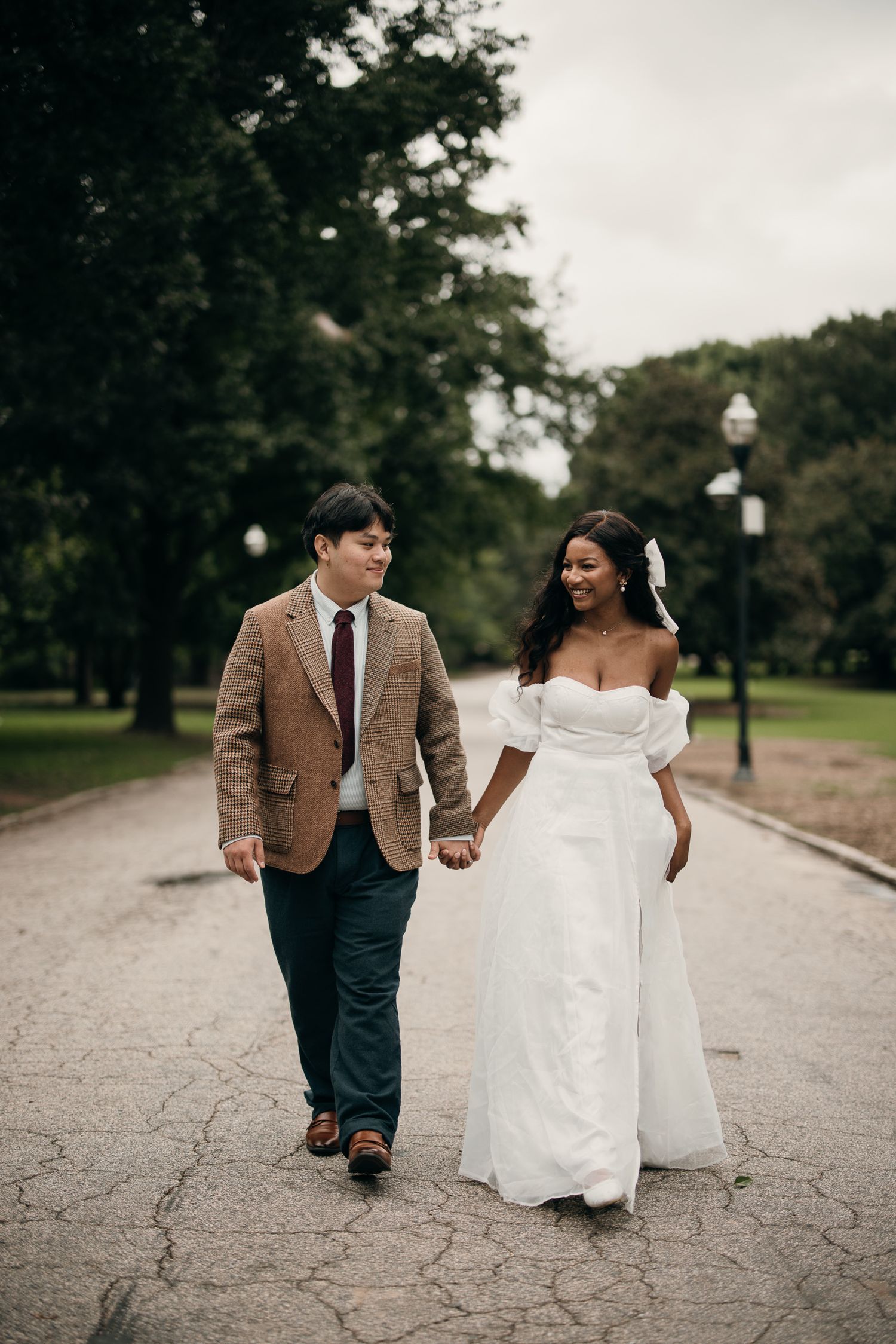 Romantic elopement session stroll through the lush greenery of Piedmont Park, Midtown.