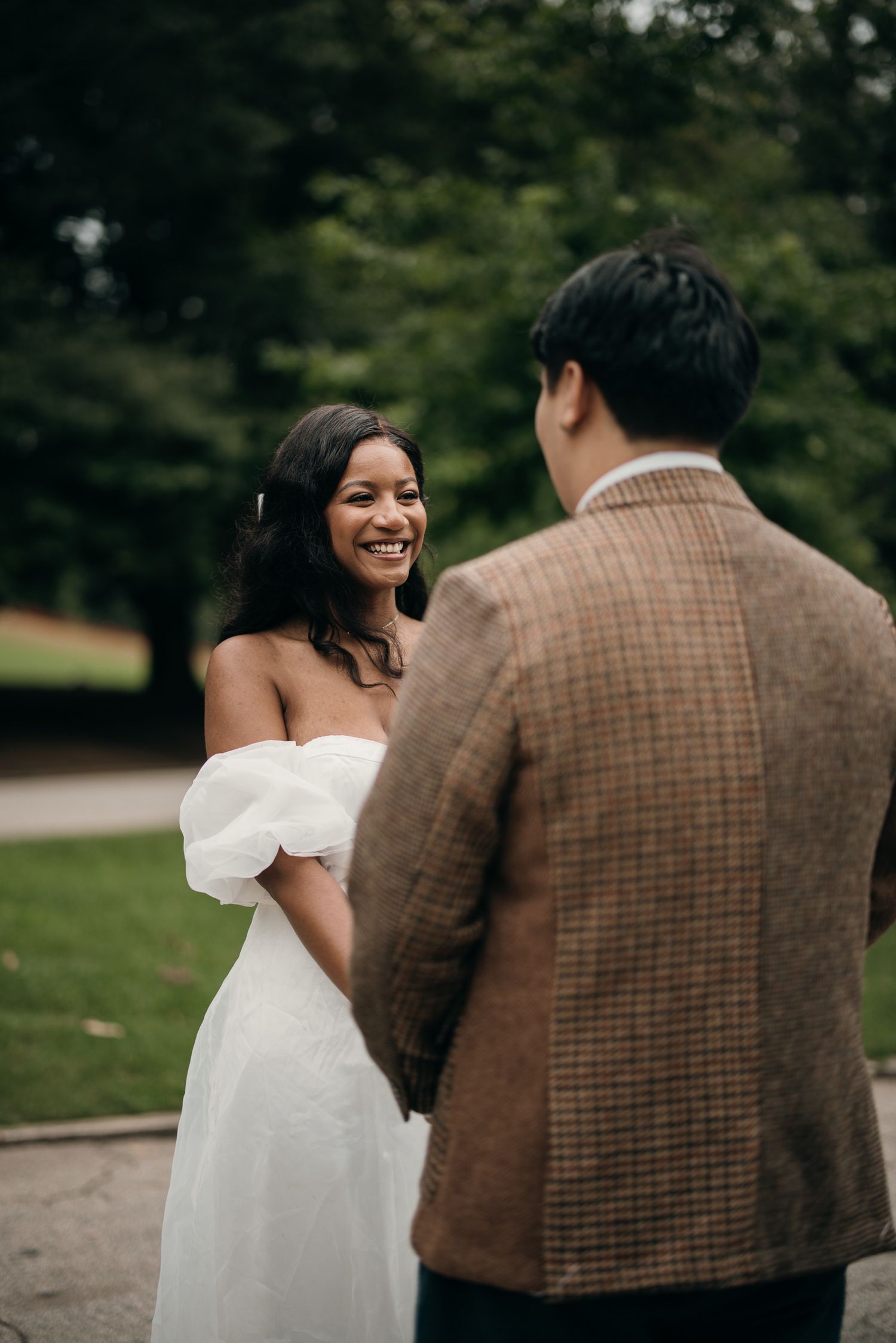 Romantic elopement session stroll through the lush greenery of Piedmont Park, Midtown.