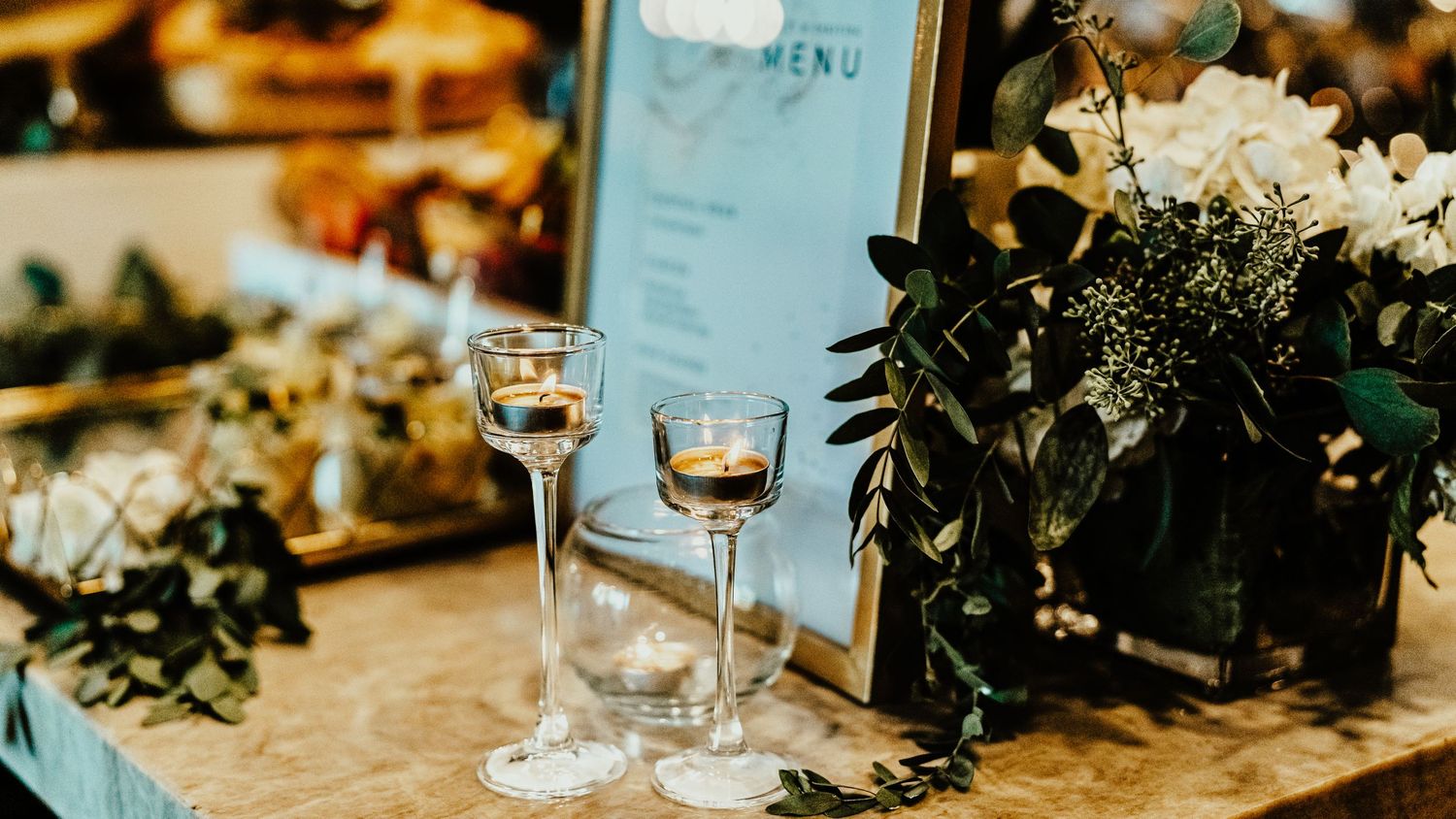 Elegant table setting with floral arrangements and glassware for special occasion. Session in Phoenix Arizona