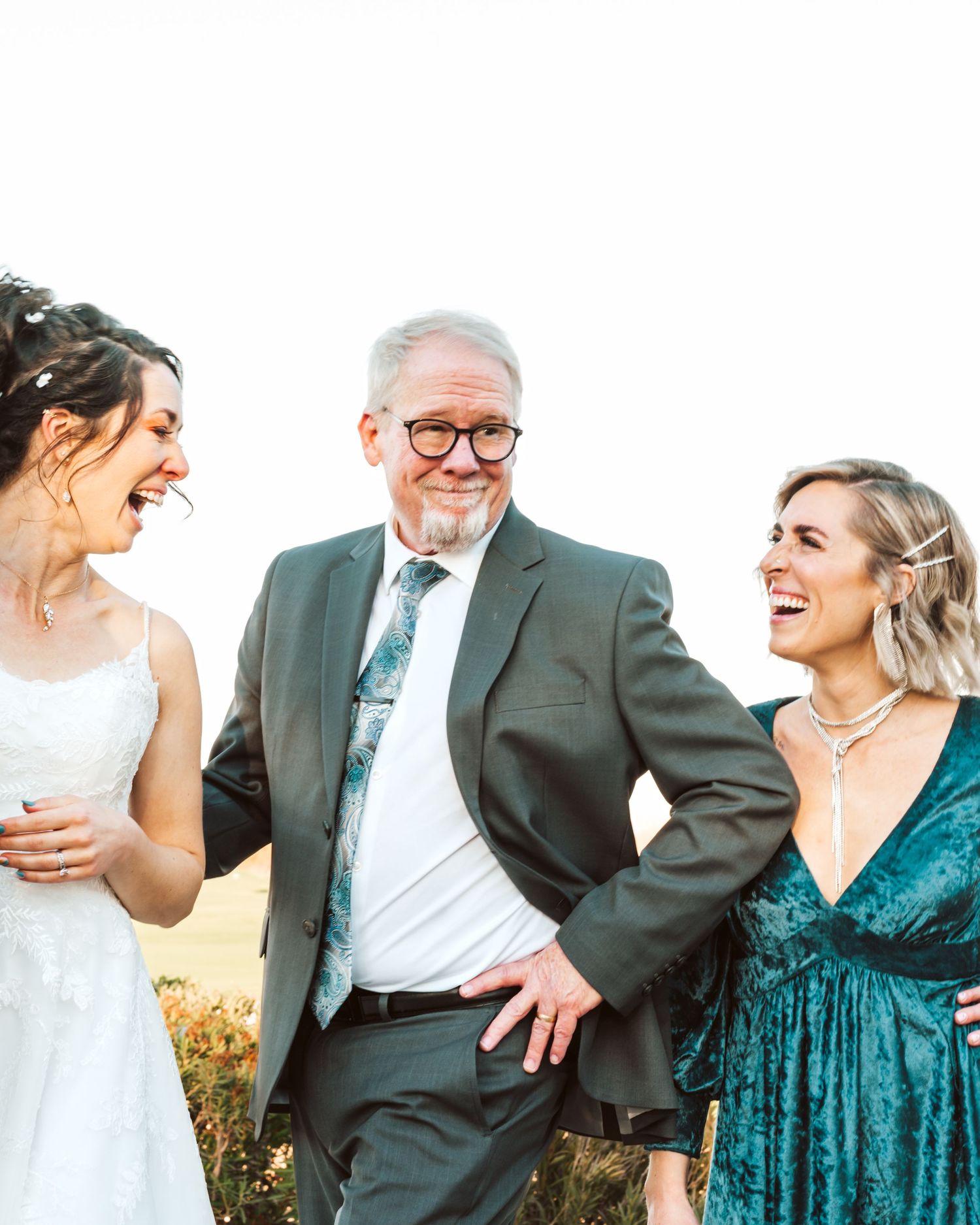 Candid outdoor group photos showing joyful laughter and natural expressions.