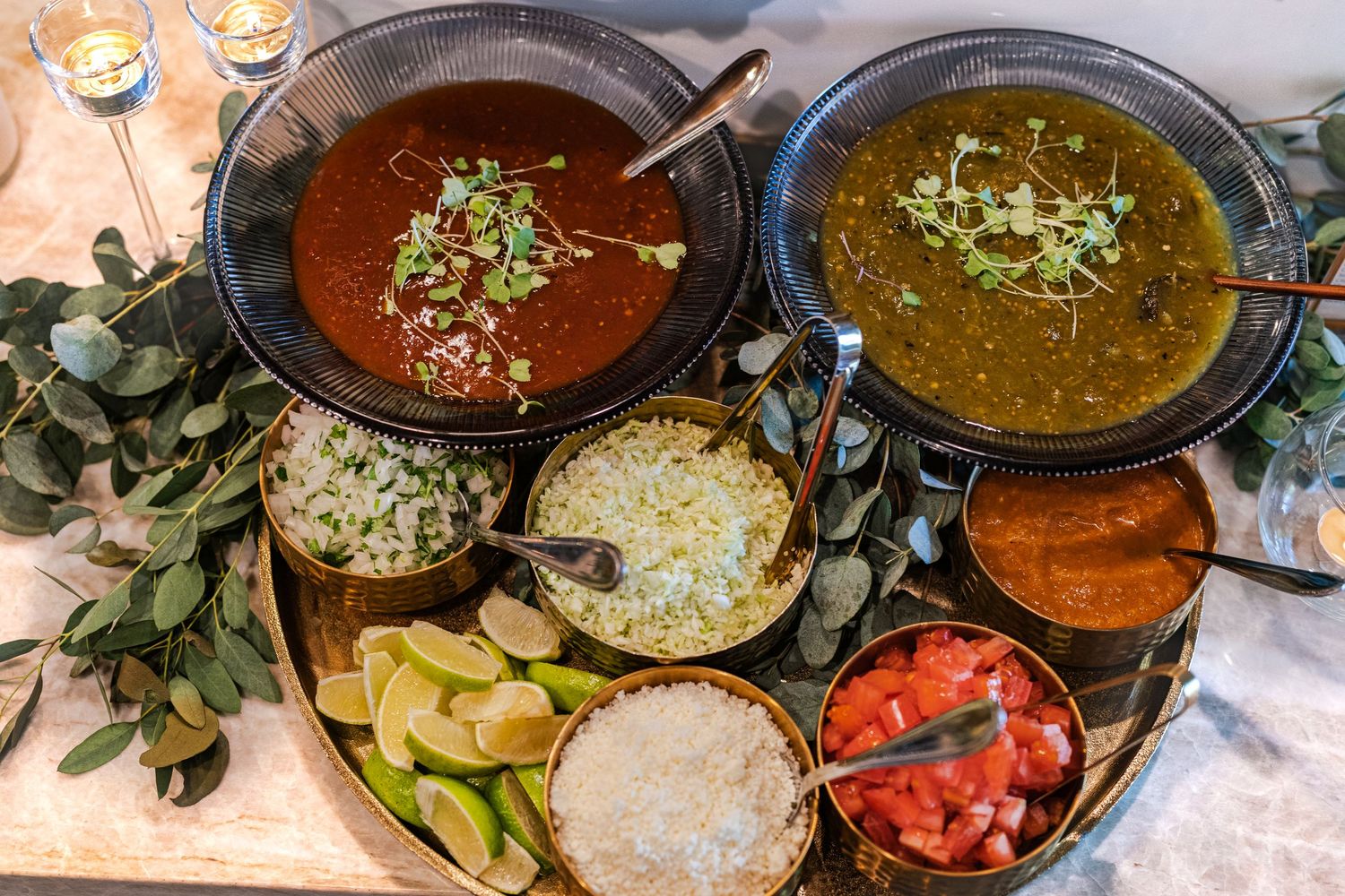 Mexican food spread with salsas, rice, toppings and garnishes arranged on serving platter. Session in Phoenix Arizona