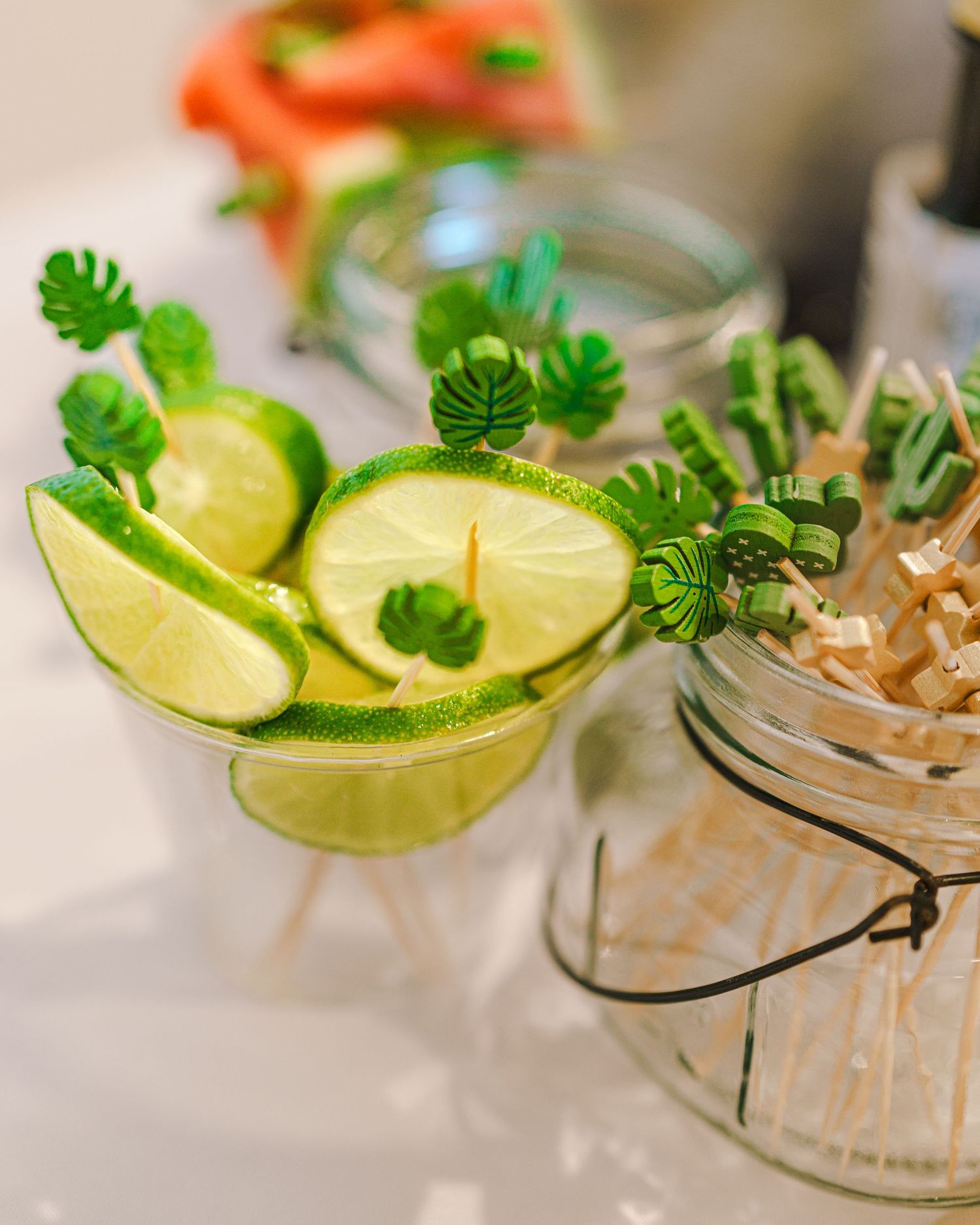 Fresh lime garnish with tropical leaf decorations in cocktail glass.
Session in Phoenix Arizona