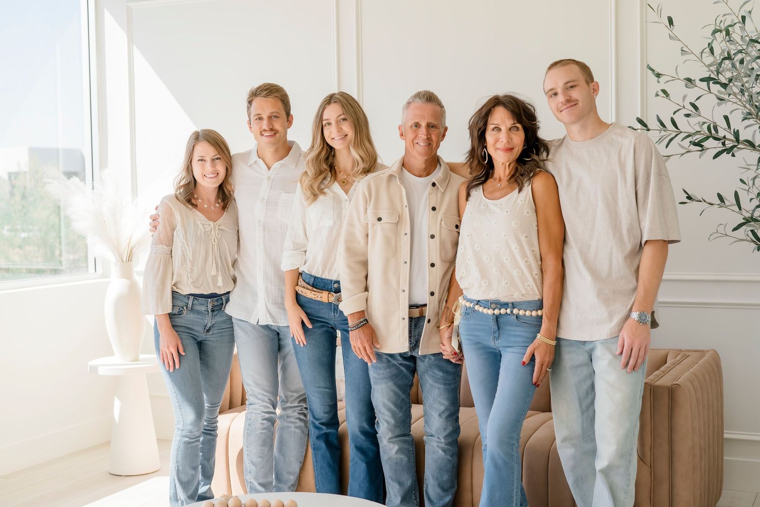 Casual group photo in bright modern interior with neutral clothing.
Family photo session in Scottsdale Arizona