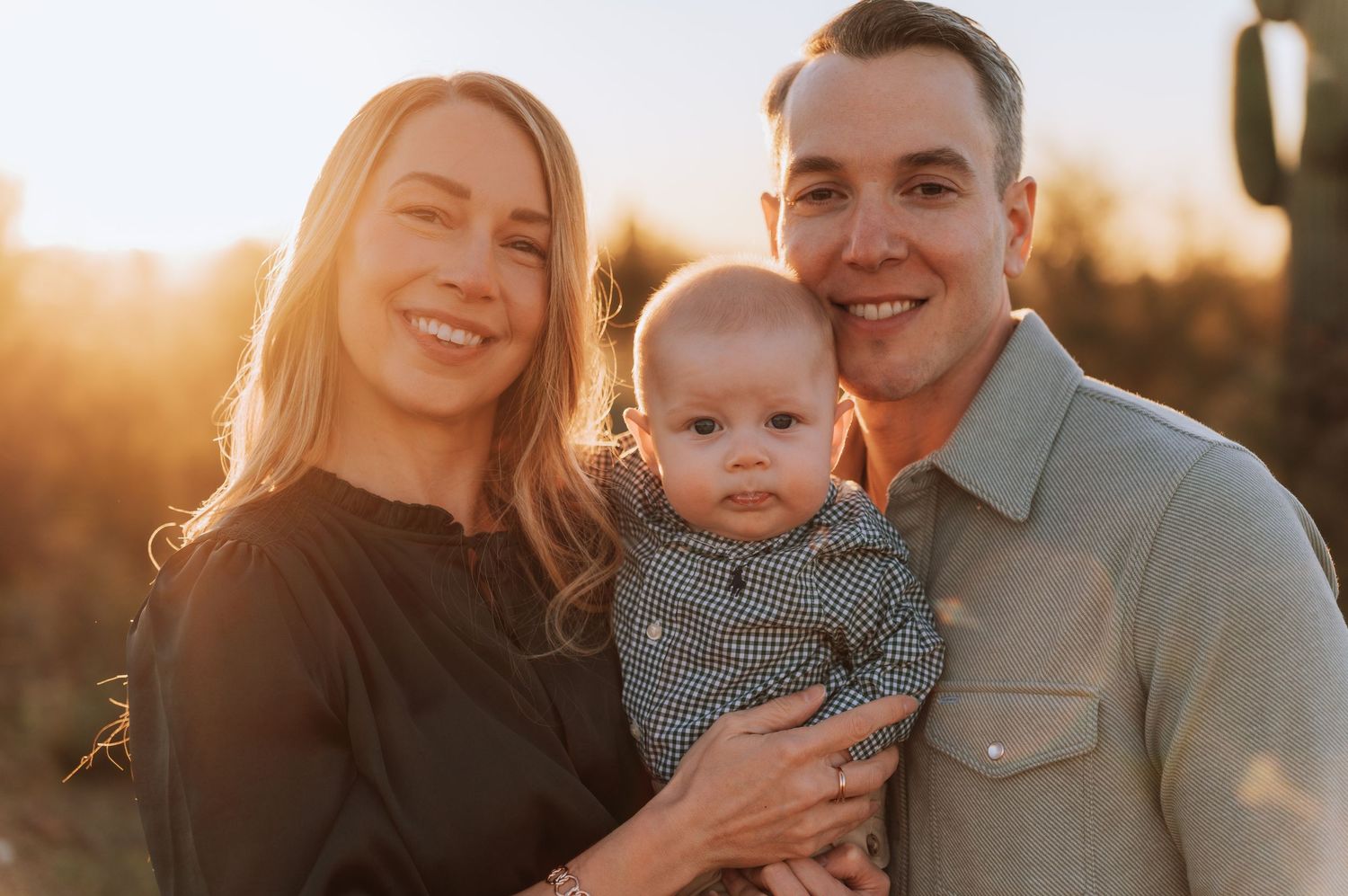 A happy family poses together outdoors during golden hour sunset in a series of warm, candid photographs.