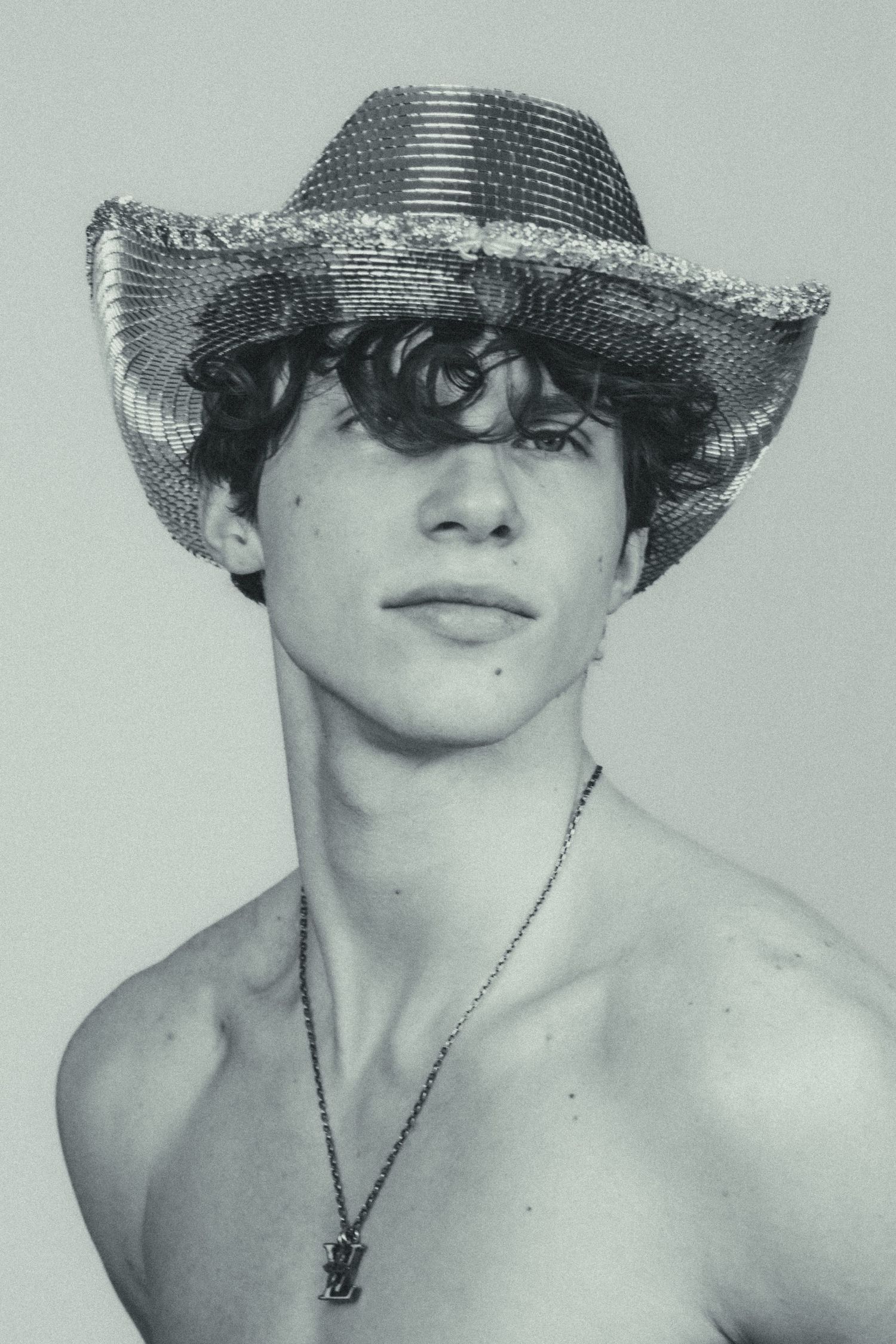 A man in a cowboy hat.