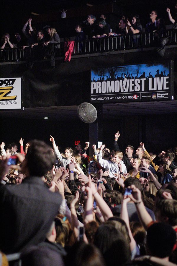 A crowd of people cheering