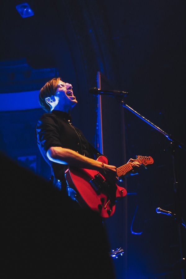 A man singing into a microphone