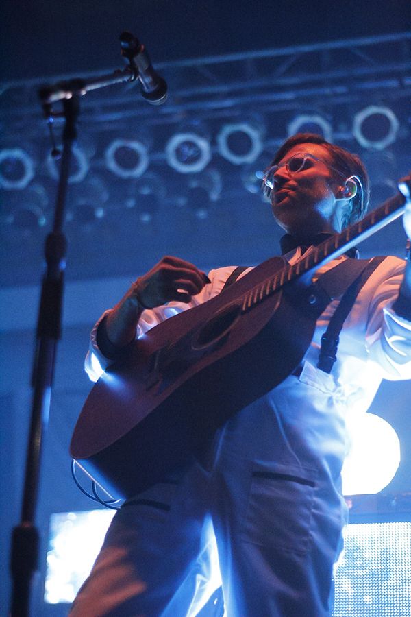 A man playing a guitar