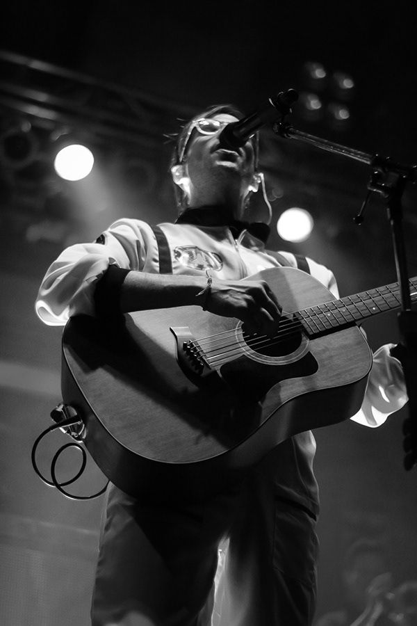A man playing guitar