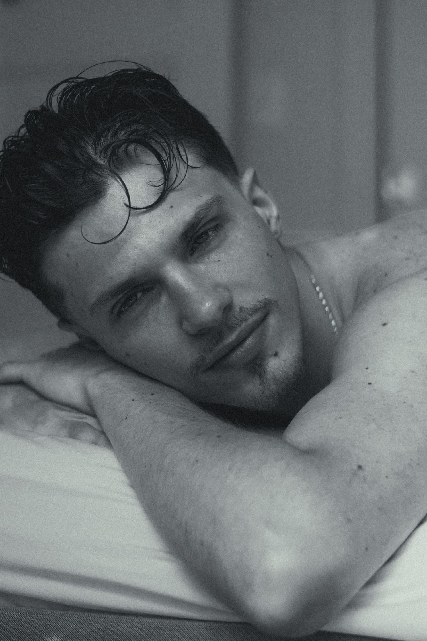 A man laying in bed.