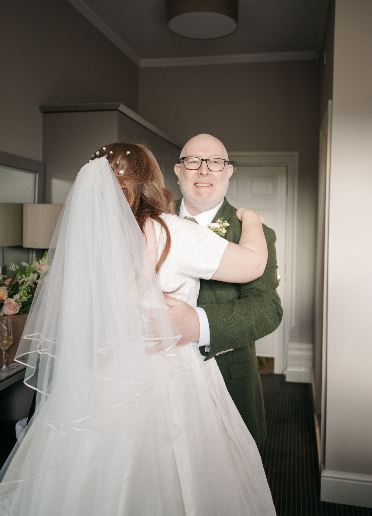 A series of intimate first look wedding photos showing the couple meeting before their ceremony.