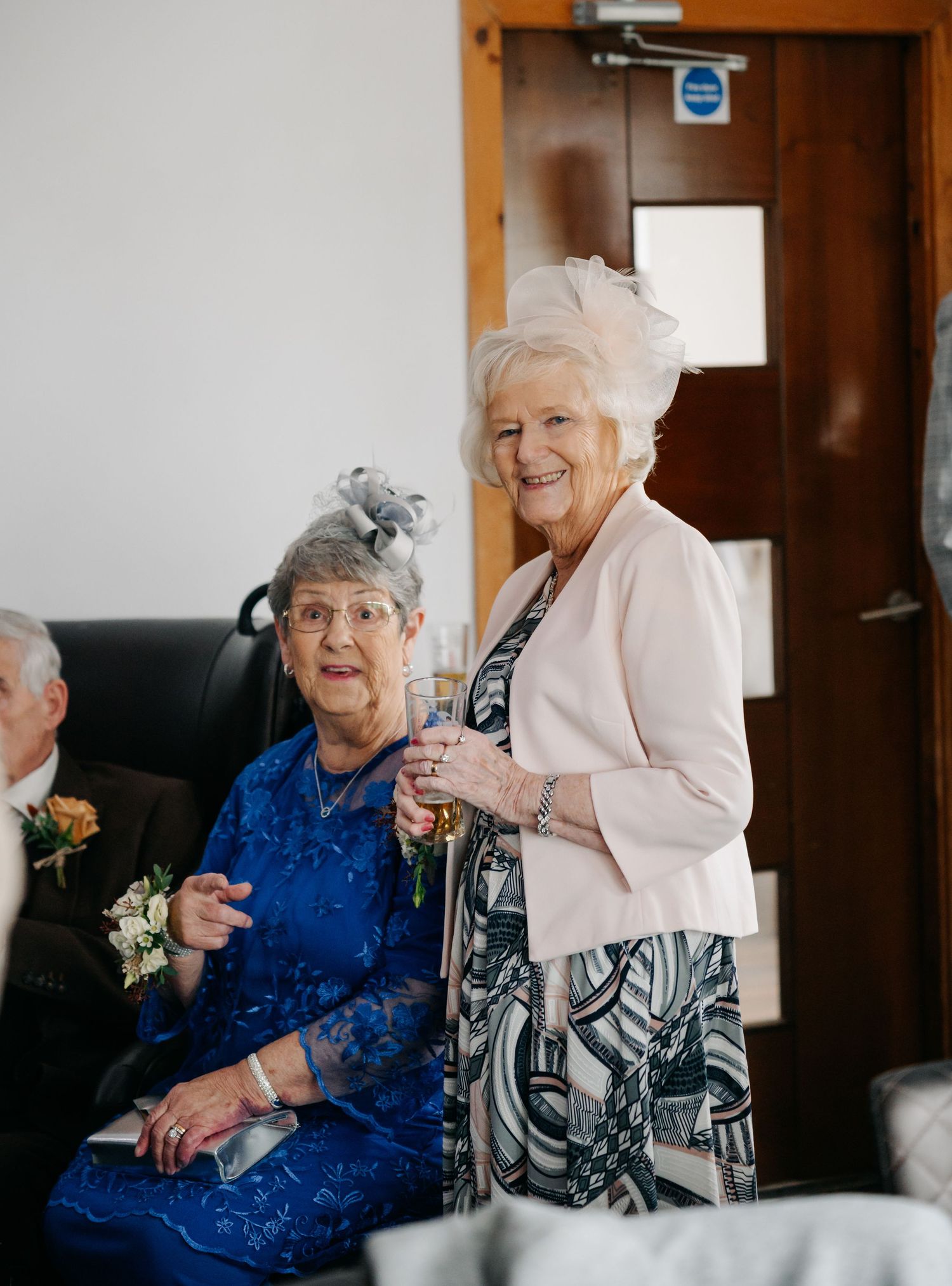 Wedding guests enjoying a joyful moment during the celebration.