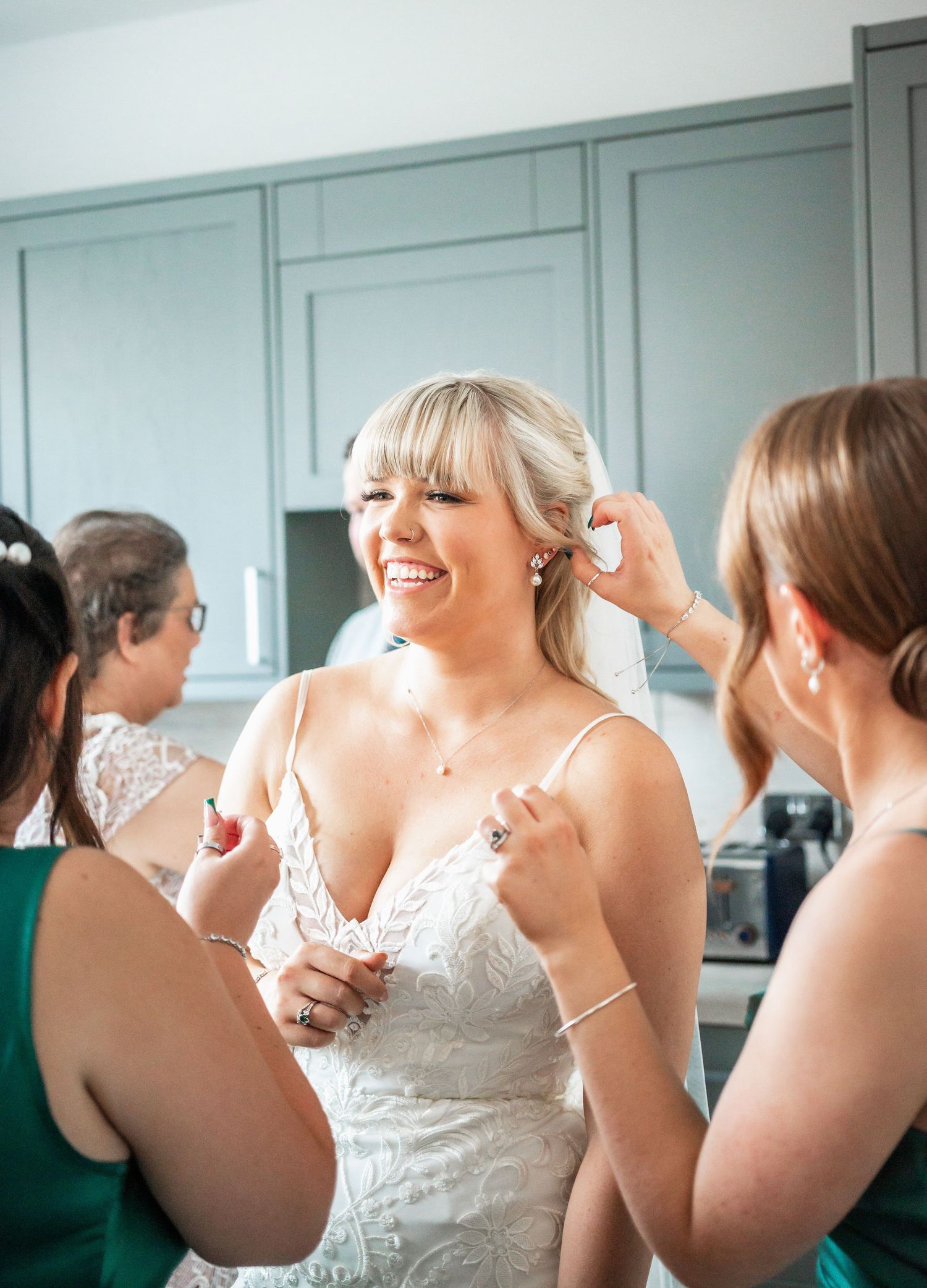 Wedding preparations showing joyful moments during bridal getting-ready festivities.