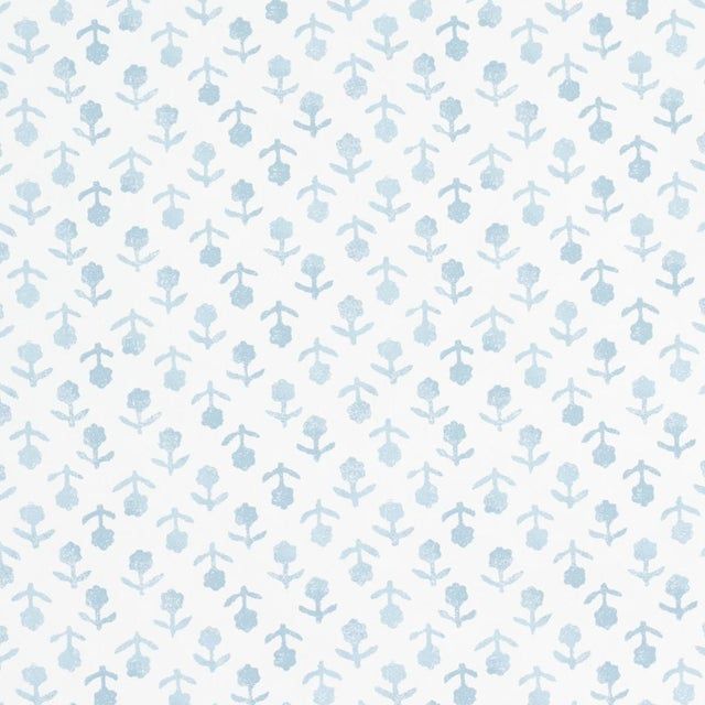 Delicate blue floral pattern on white background in seamless repeat design.
