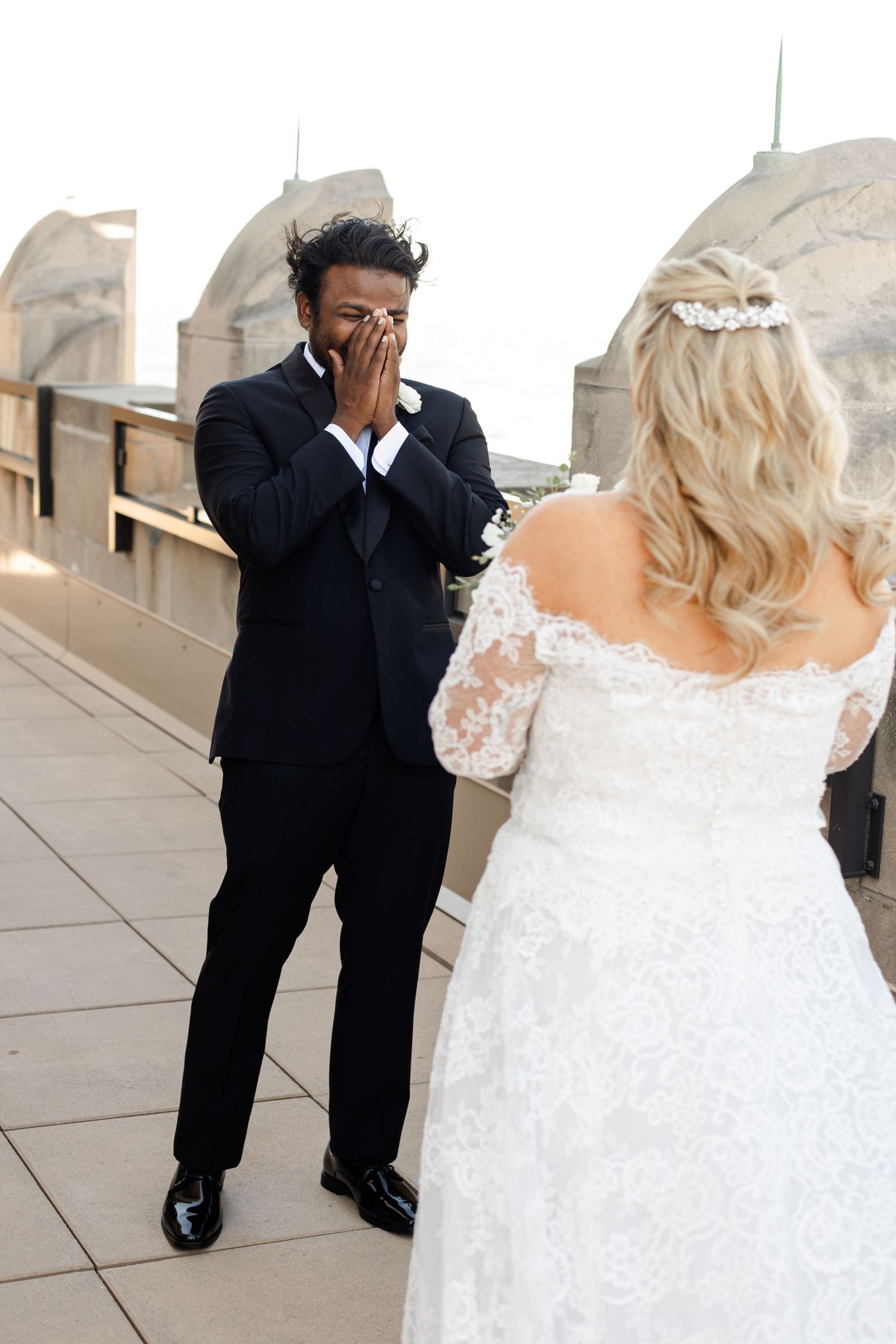 An emotional first look moment between a couple on their wedding day. The Grand Hall, Kansas Ciry.