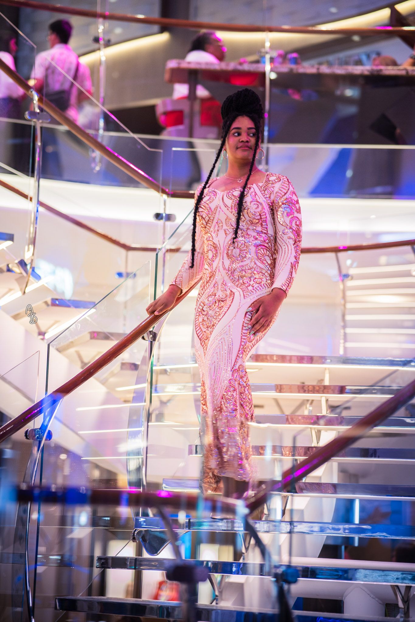 a girl in formal dress on a staircase