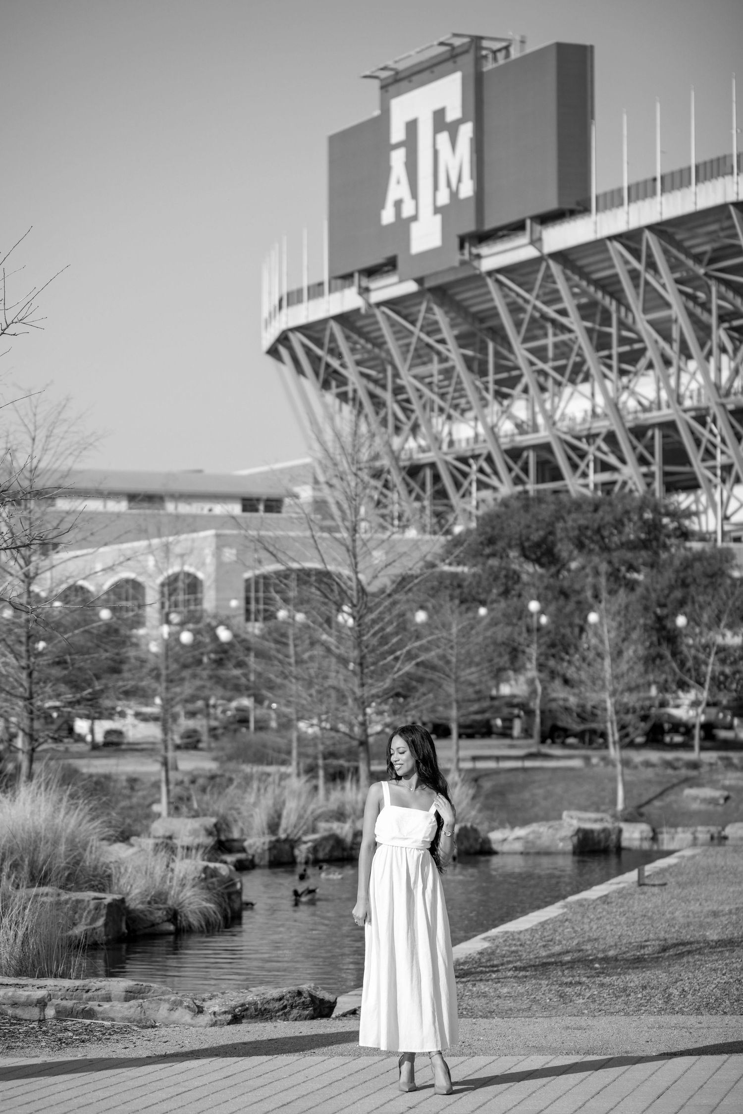Black and white panoramic photo series showing the exterior of Texas A&M's Kyle Field stadium and surrounding landscape.