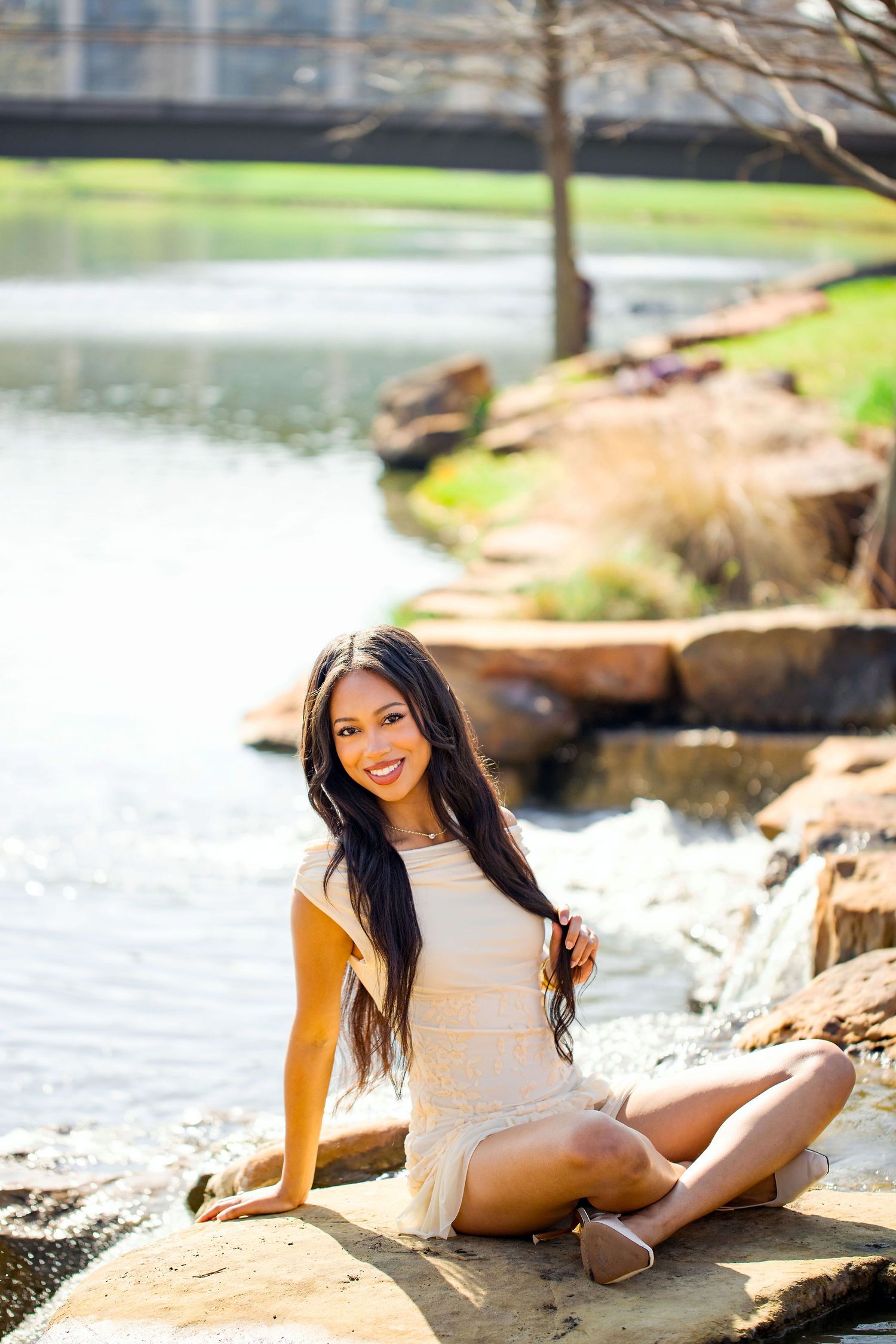 Natural waterfront scene with rocks and water creating a peaceful backdrop.
