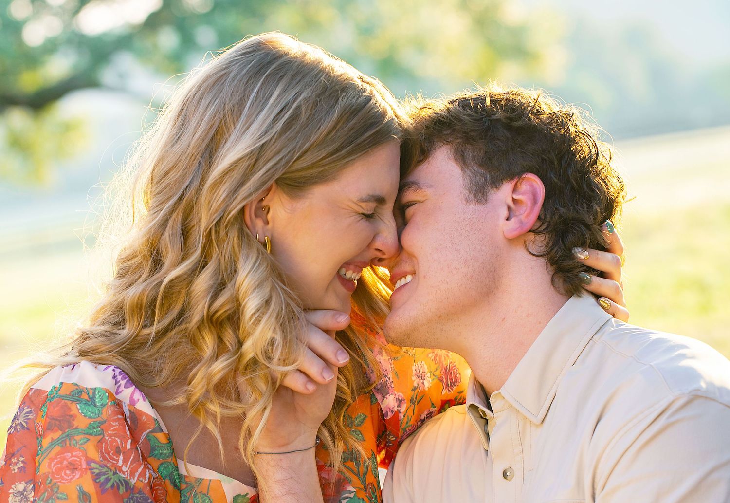 A romantic moment shared between a dreamy couple in  during a golden hour outdoor photoshoot In Brenham Texas.