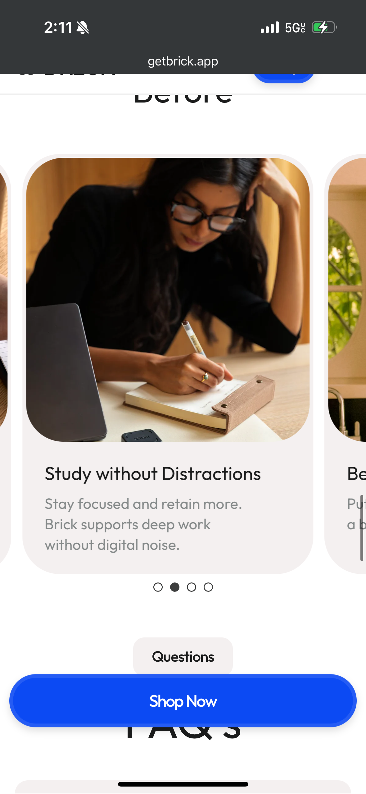 A focused woman with glasses writes in a notebook at a desk, promoting distraction-free studying with Brick app.