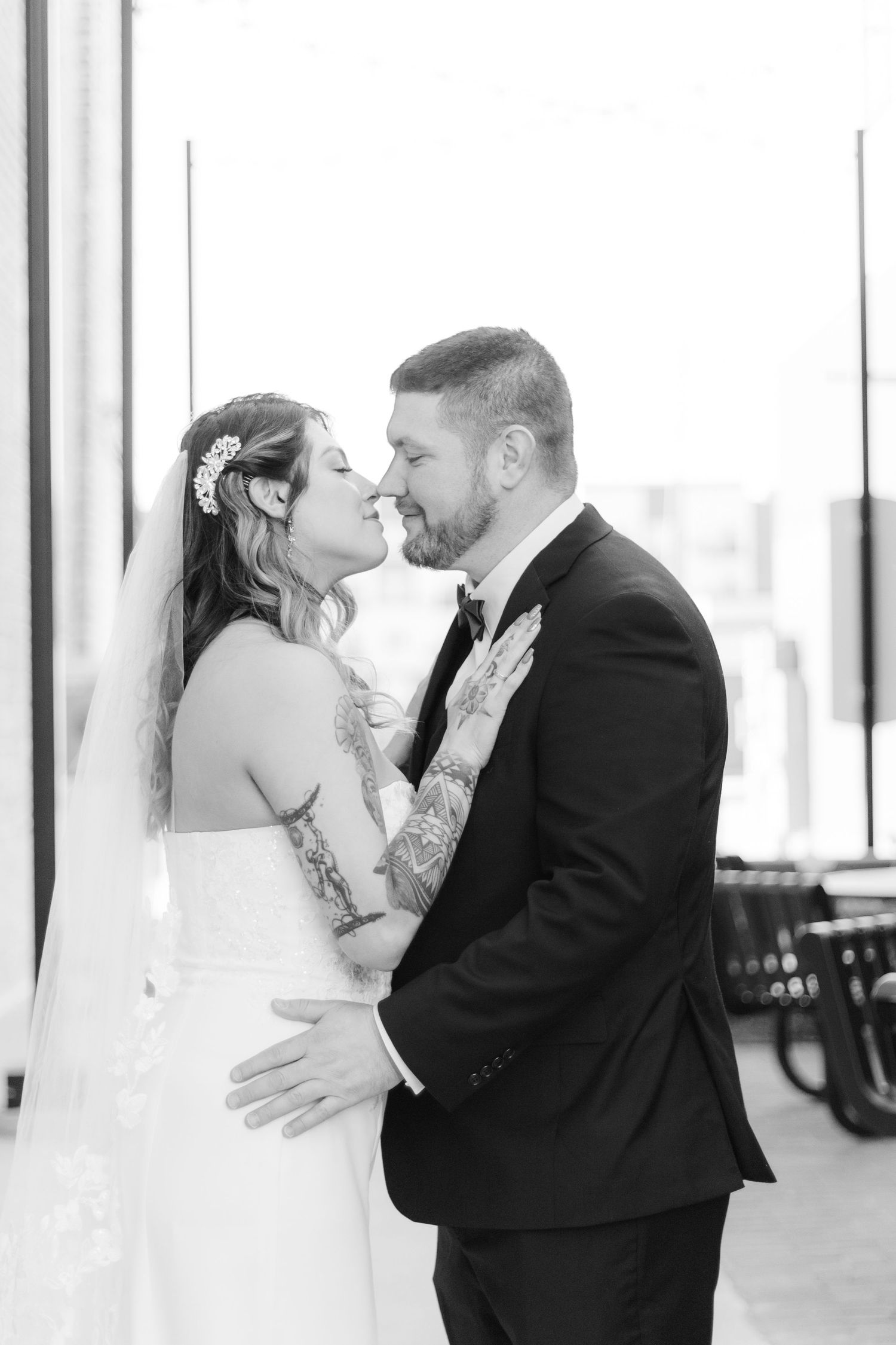A romantic wedding photo collage showing three intimate moments between a couple in formal attire.