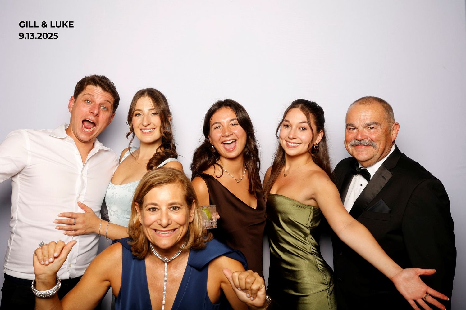 A series of photo booth style party snapshots showing people posing and smiling together at a celebration event.