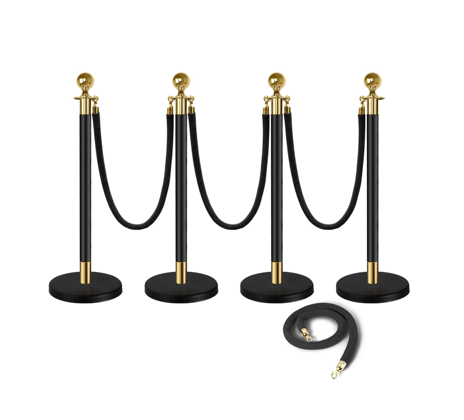 A set of four black rubber stethoscope eartips with gold-colored metal connectors arranged in a row.