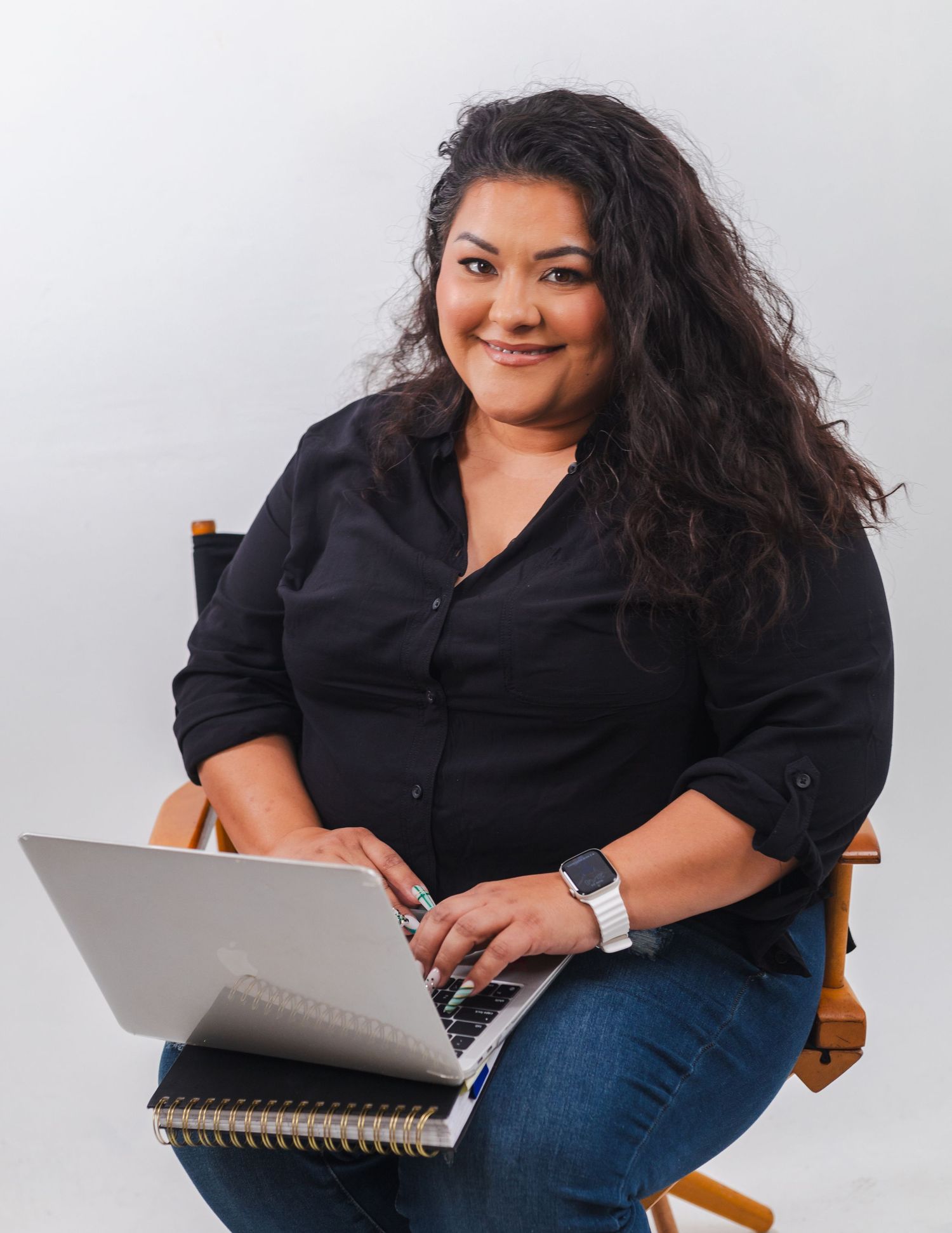Julia Camacho, photographer and founder of Captured Moments Photography, building her photography portfolio while capturing family, sports,