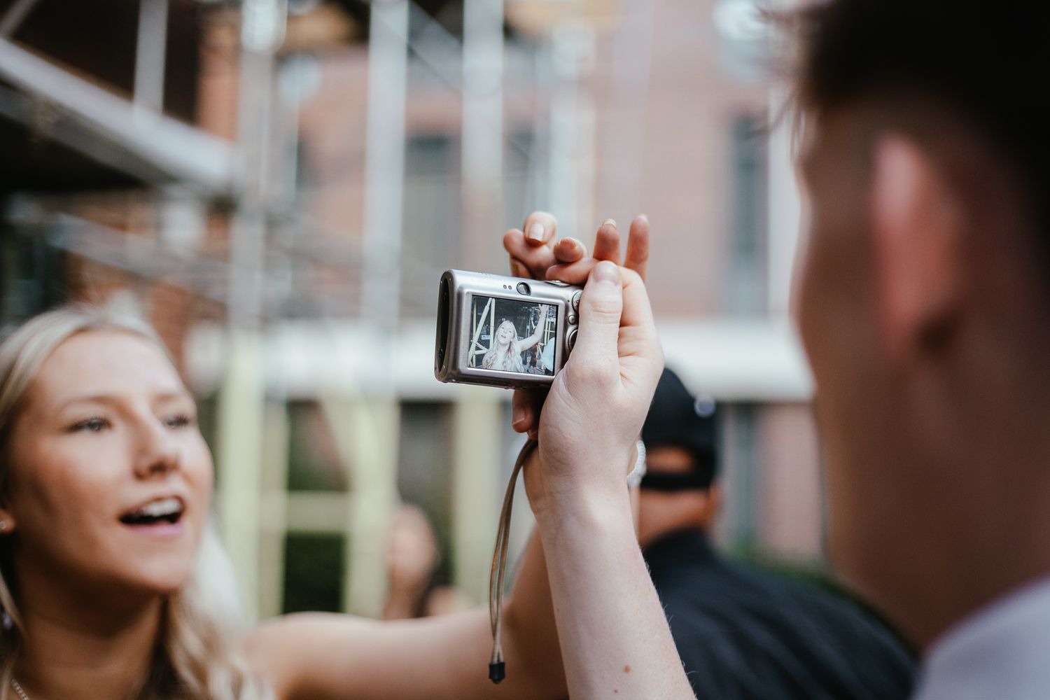 Candid reactions of guests during a joyful moment at a celebration.