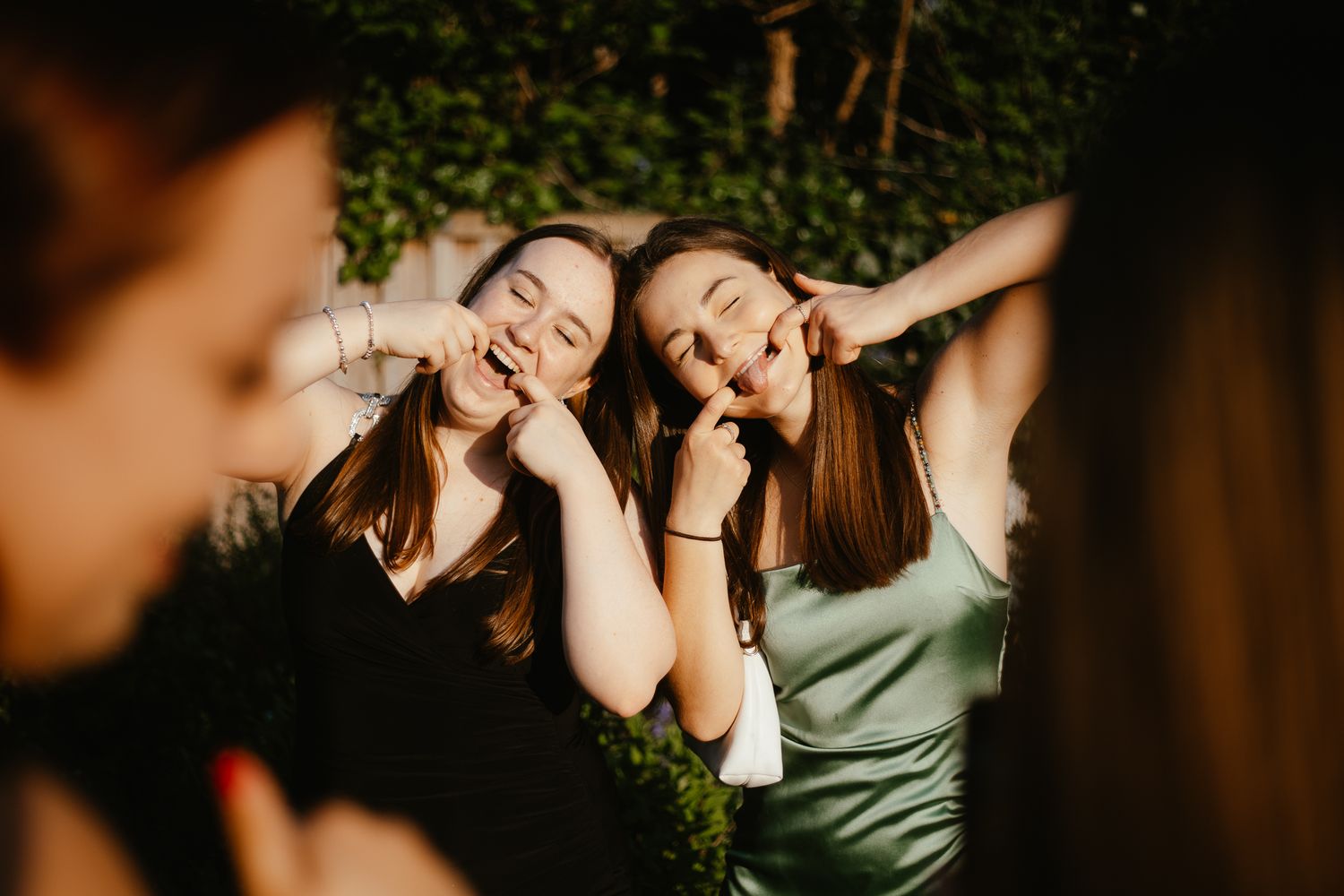 Candid evening shots show friends laughing and enjoying themselves outdoors.