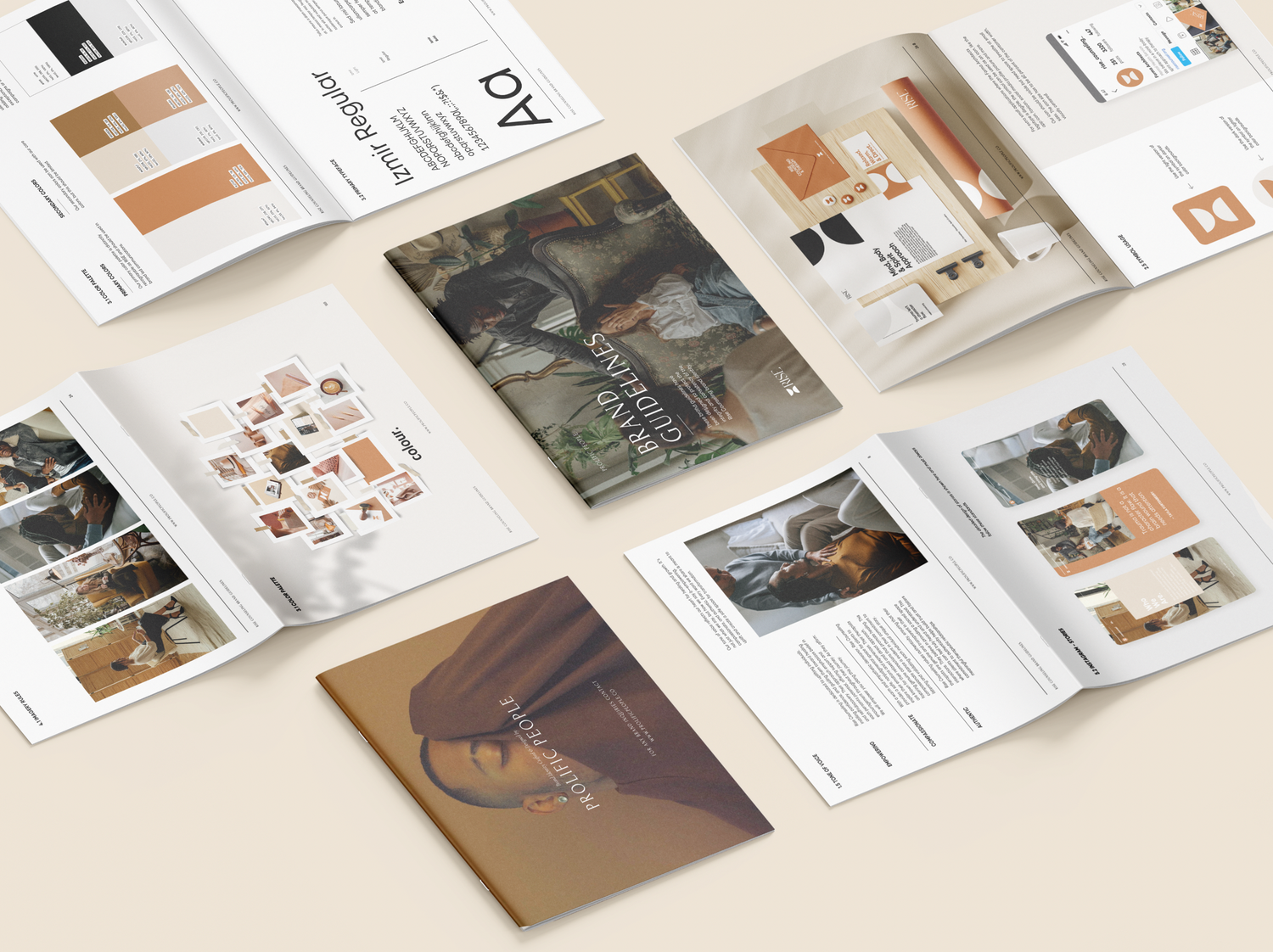 Flat lay of open brand style guide pages showing design elements and photography.