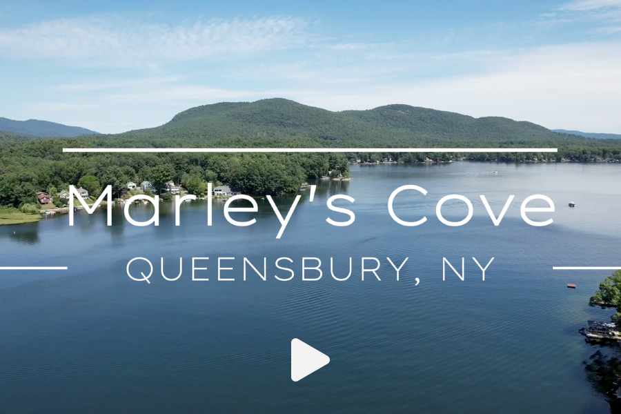 Photo showing start screen of vacation rental video from an aerial view.