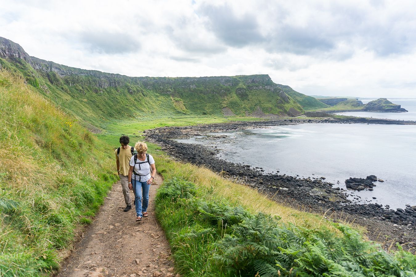 Woman and boy hiking in the Mourne Mountain in Northern Ireland