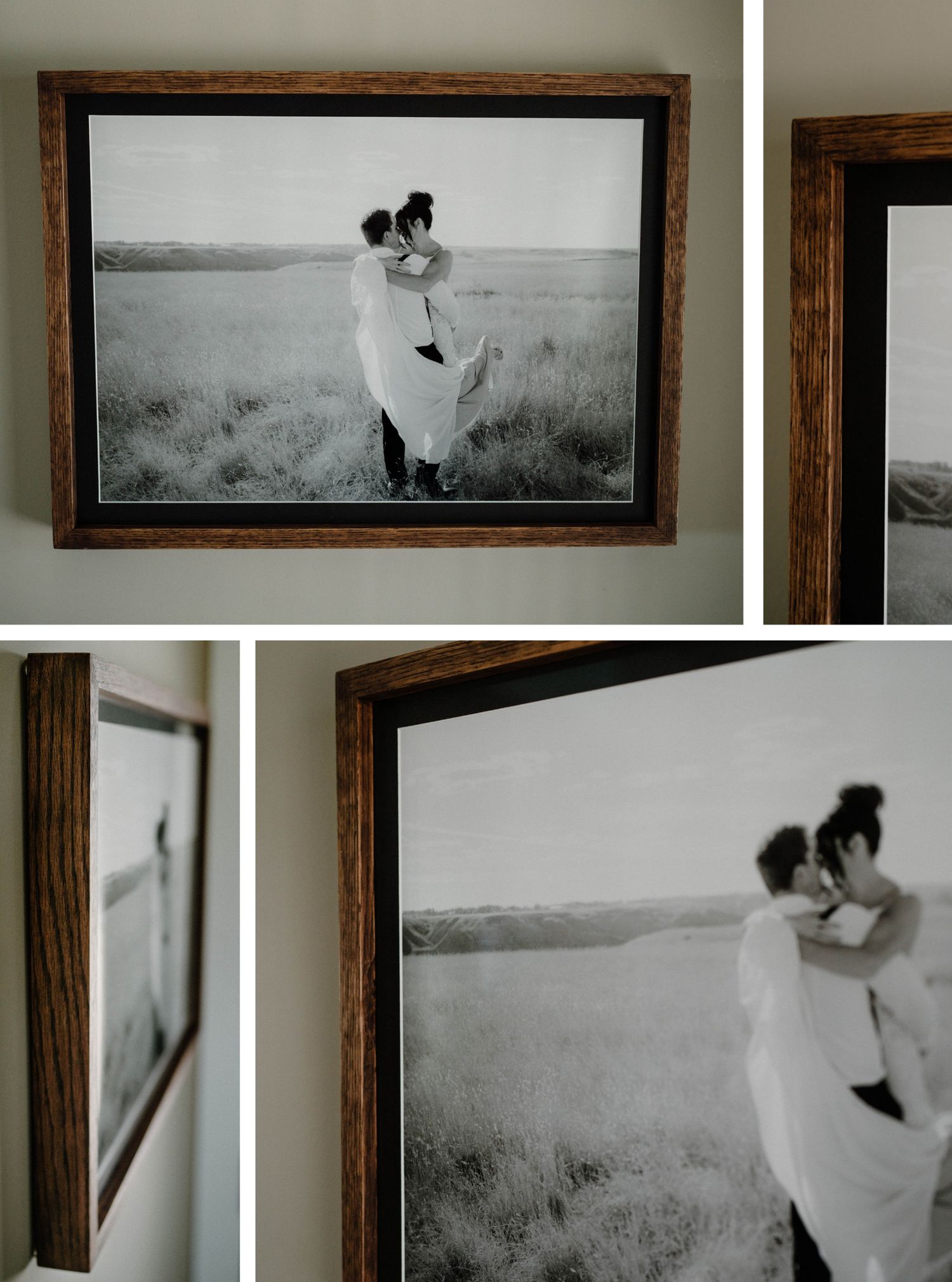 Black and white wedding photo in rustic wood frame showing couple embracing in open field.
