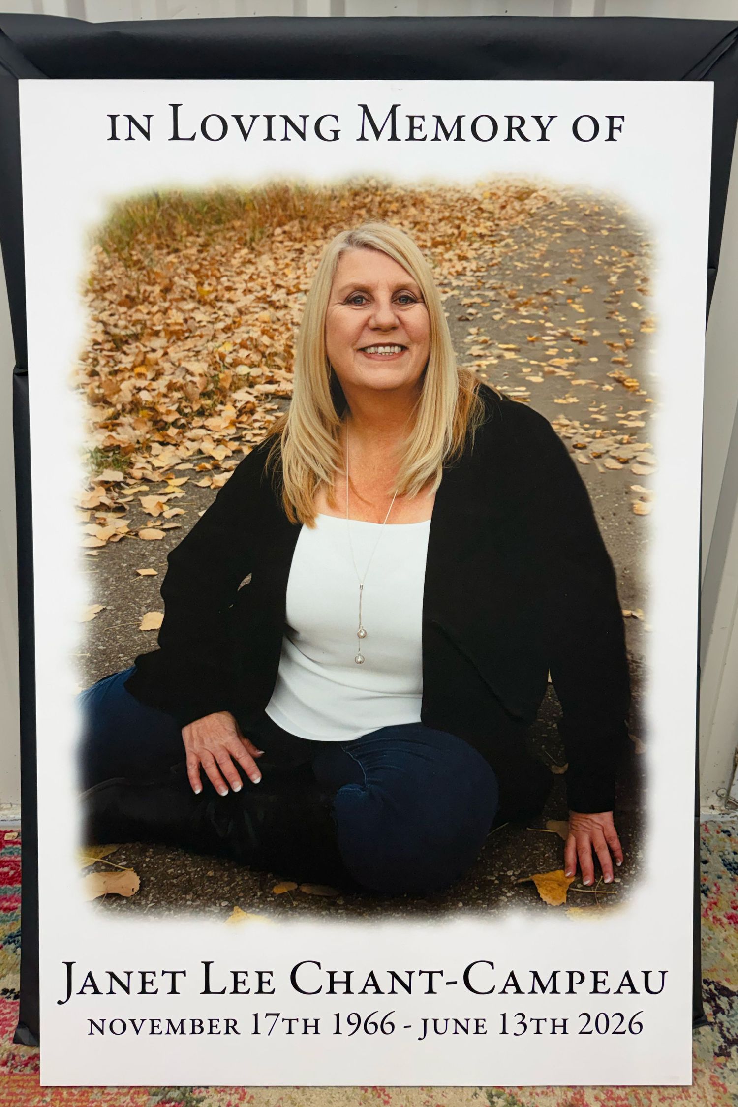 Memorial poster for Janet Lee Chant-Campeau, November 17th 1966 - June 13th 2026, showing a smiling blonde woman seated outdoors.
