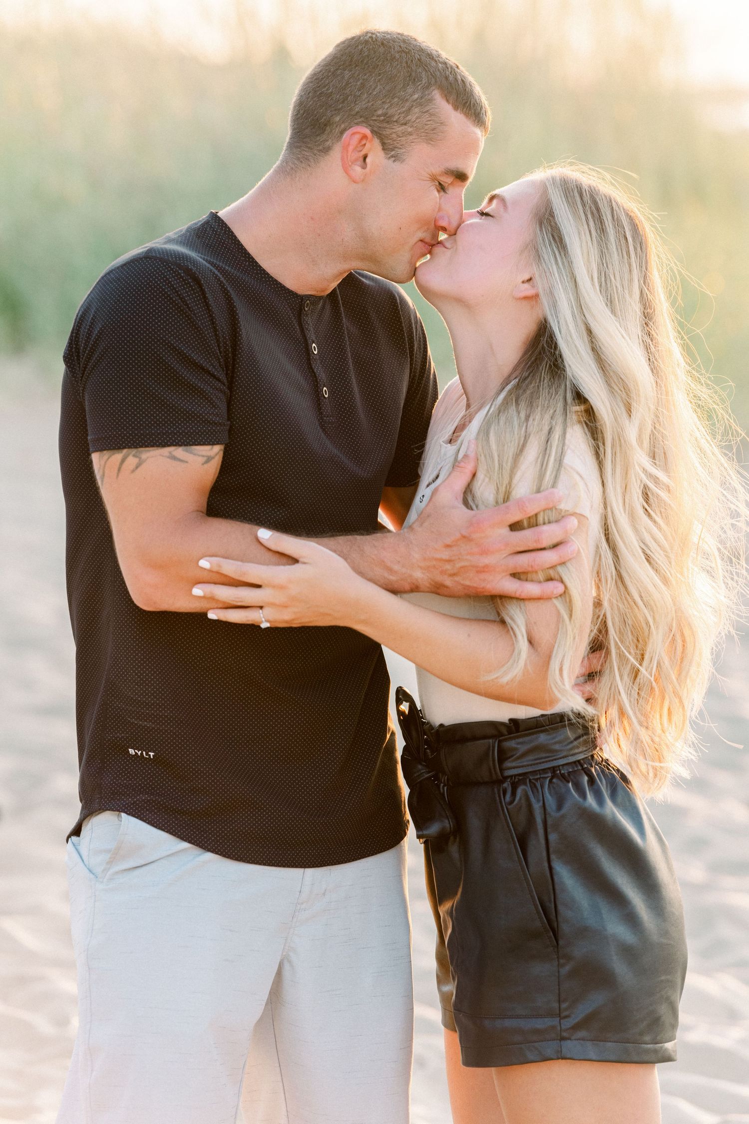 Couples portrait during beach proposal in Virginia Beach