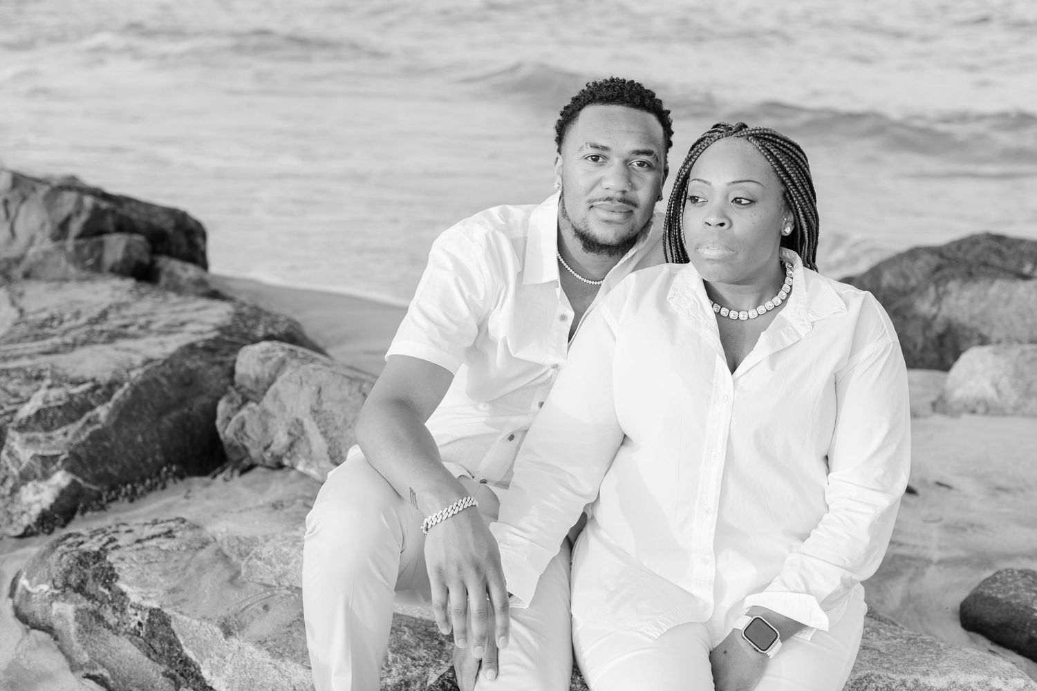 Couples portrait on the beach in Hampton, Virginia at Buckroe Beach.
