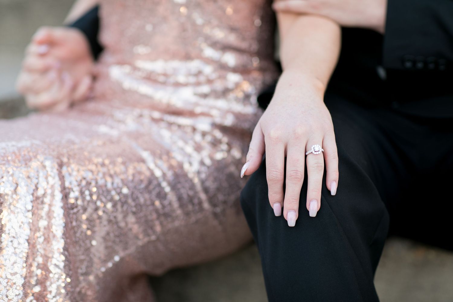 a close up of an engagement ring shortly after a proposal